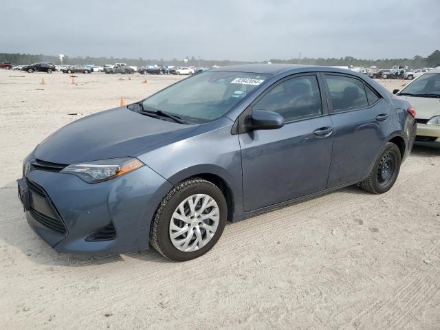 TOYOTA COROLLA L 2017 with VIN 5YFBURHE3HP716216 - Photo from auction