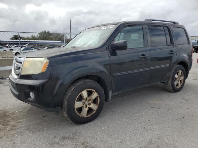 HONDA PILOT EXLN 2011 with VIN 5FNYF3H70BB005112 - Photo from auction