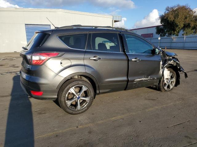 Photo 3 from auction – 2017 FORD ESCAPE SE with VIN 1FMCU0GD5HUB53628