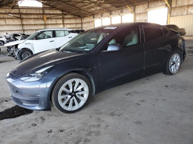 TESLA MODEL 3 2022 with VIN 5YJ3E1EB9NF347849 - Photo from auction