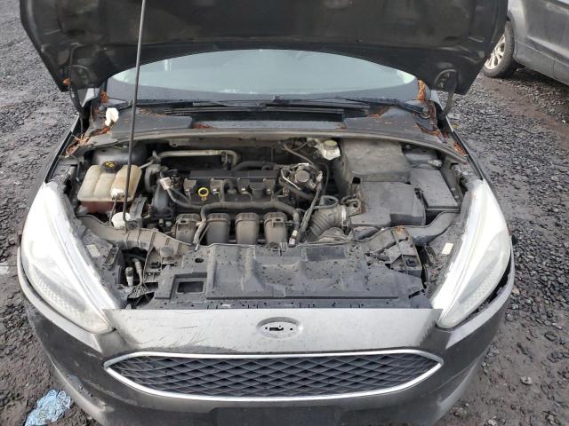 Photo 11 from auction – 2017 FORD FOCUS S with VIN 1FADP3E23HL324536