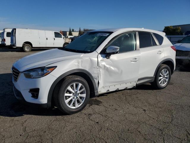 Photo 1 from auction – 2016 MAZDA CX-5 TOURI with VIN JM3KE2CY1G0689023