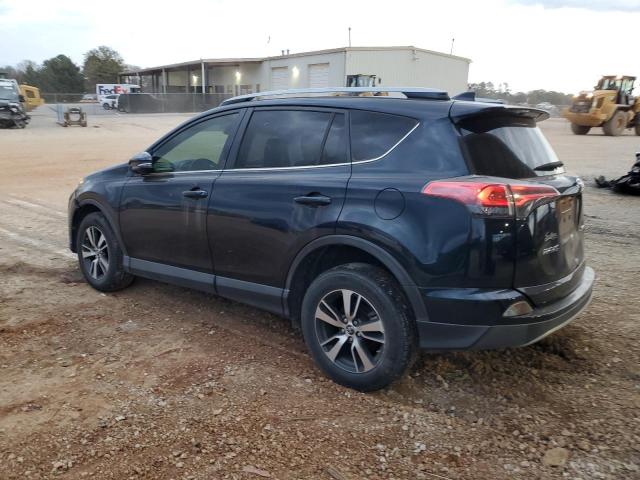 Photo 2 from auction – 2017 TOYOTA RAV4 XLE with VIN JTMWFREV7HD104992