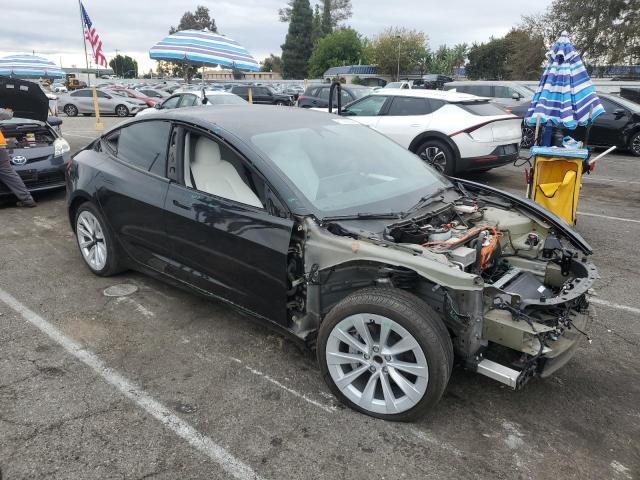 Photo 4 from auction – 2023 TESLA MODEL 3 with VIN 5YJ3E1EA9PF622615