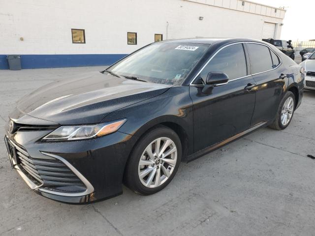 TOYOTA CAMRY LE 2021 with VIN 4T1C11AK3MU525919 - Photo from auction