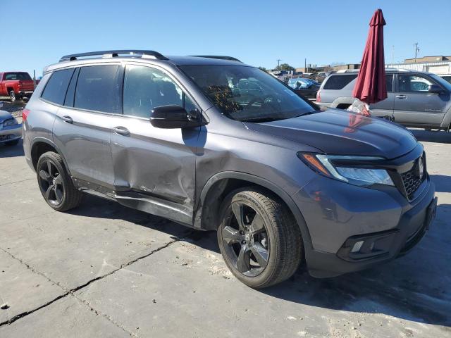 Photo 4 from auction – 2021 HONDA PASSPORT E with VIN 5FNYF8H04MB034700