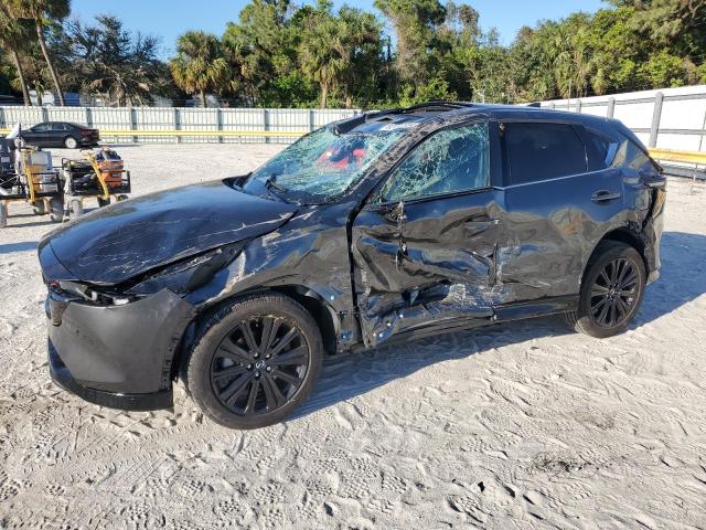 MAZDA CX-5 2022 with VIN JM3KFBAYXN0560985 - Photo from auction