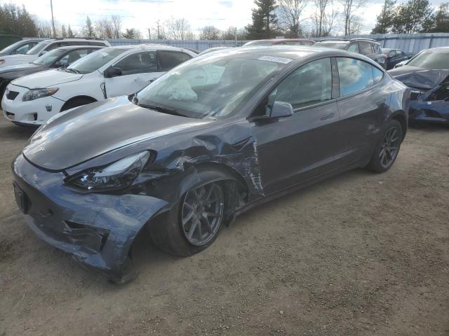 TESLA MODEL 3 2023 with VIN LRW3E1FA9PC921188 - Photo from auction