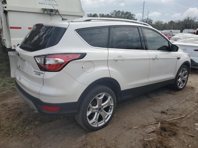 Photo 3 from auction – 2017 FORD ESCAPE TIT with VIN 1FMCU9J9XHUD02060