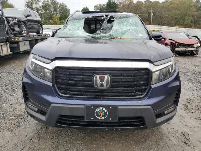 Photo 5 from auction – 2022 HONDA RIDGELINE with VIN 5FPYK3F78NB015283