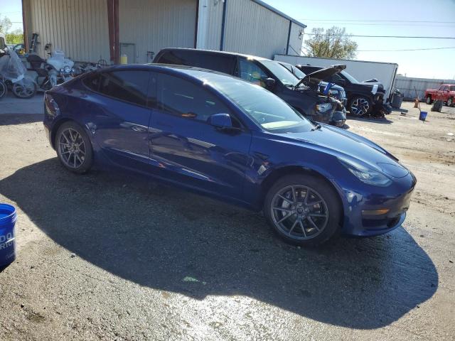 Photo 4 from auction – 2022 TESLA MODEL 3 with VIN 5YJ3E1EB0NF262057