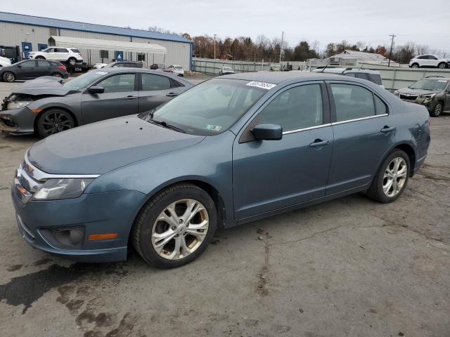 FORD FUSION 2012 with VIN 3FAHP0HA3CR305109 - Photo from auction