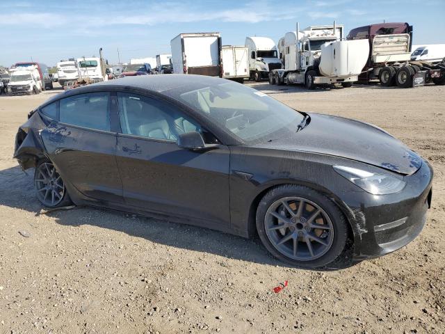 Photo 4 from auction – 2023 TESLA MODEL 3 with VIN 5YJ3E1EA1PF661148