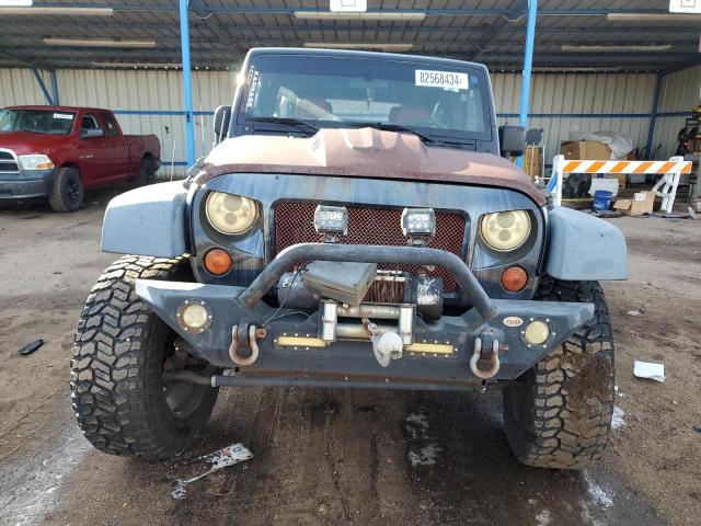 Photo 5 from auction – 2013 JEEP WRANGLER U with VIN 1C4BJWDG7DL689054