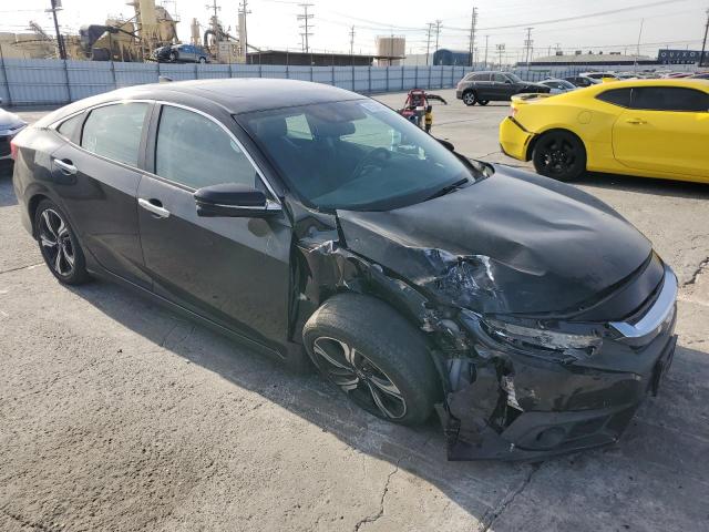Photo 4 from auction – 2016 HONDA CIVIC TOUR with VIN 2HGFC1F93GH648470