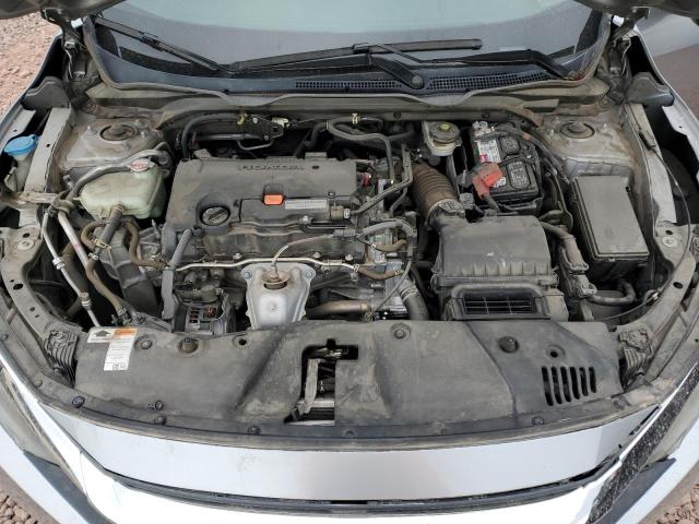 Photo 11 from auction – 2018 HONDA CIVIC LX with VIN 19XFC2F53JE019148