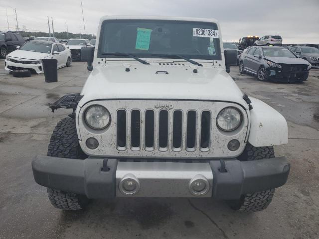 Photo 5 from auction – 2016 JEEP WRANGLER U with VIN 1C4BJWEG3GL298308
