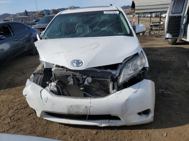 Photo 5 from auction – 2014 TOYOTA SIENNA XLE with VIN 5TDYK3DC0ES467281