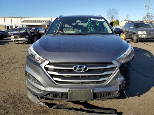 Photo 5 from auction – 2018 HYUNDAI TUCSON SEL with VIN KM8J3CA47JU734011