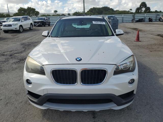 Photo 5 from auction – 2015 BMW X1 SDRIVE2 with VIN WBAVM1C55FV315473