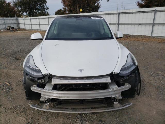 Photo 5 from auction – 2023 TESLA MODEL Y with VIN 7SAYGDEE6PA122447