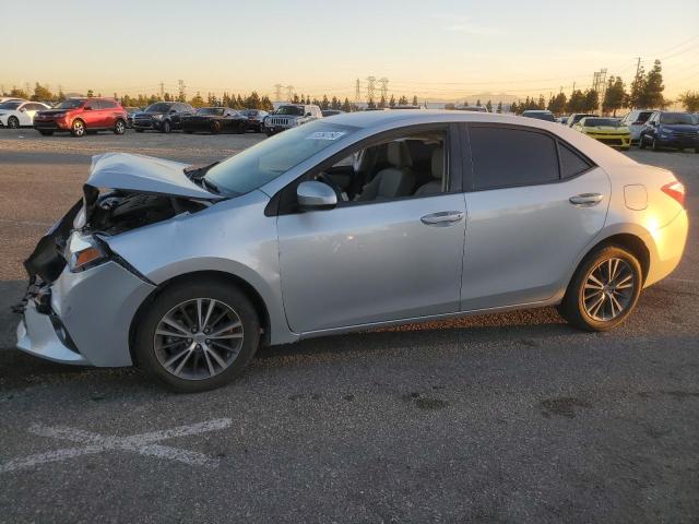 TOYOTA COROLLA L 2016 with VIN 5YFBURHE2GP466112 - Photo from auction