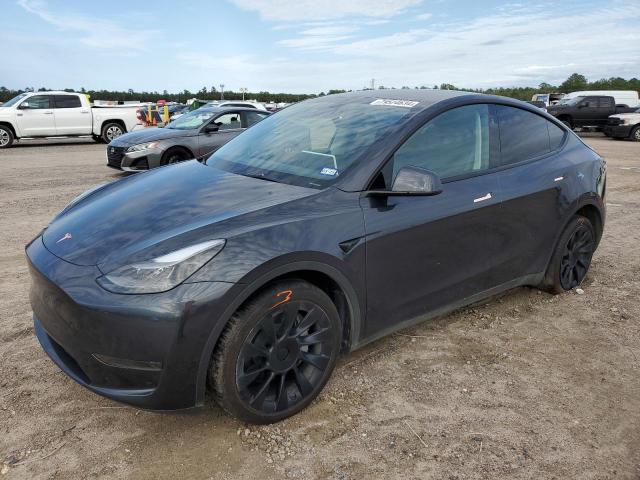 TESLA MODEL Y 2024 with VIN 7SAYGDED7RF044760 - Photo from auction