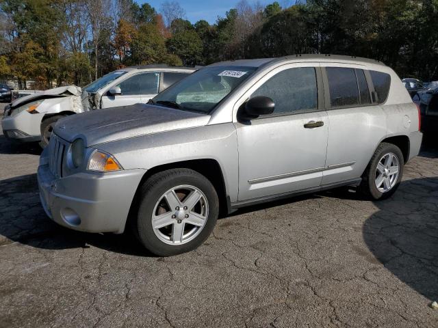 JEEP COMPASS SP 2008 with VIN 1J8FT47W98D694199 - Photo from auction