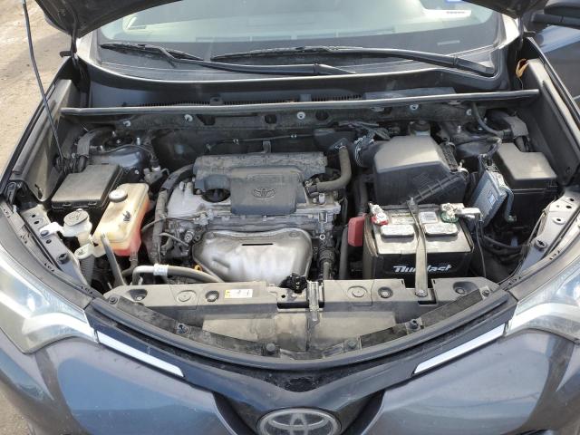 Photo 11 from auction – 2018 TOYOTA RAV4 LE with VIN JTMZFREV0JJ199464