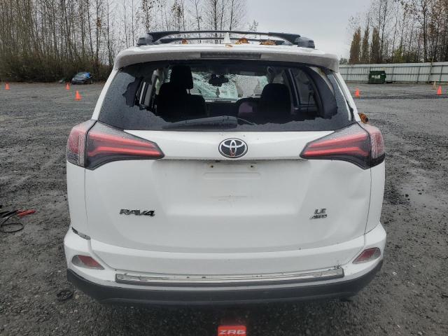 Photo 6 from auction – 2017 TOYOTA RAV4 LE with VIN JTMBFREV2HJ142372
