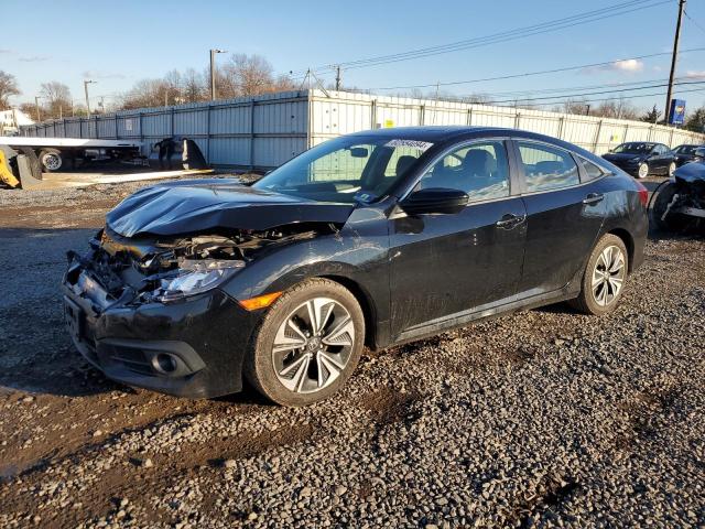 HONDA CIVIC EX 2017 with VIN 19XFC1F36HE205513 - Photo from auction