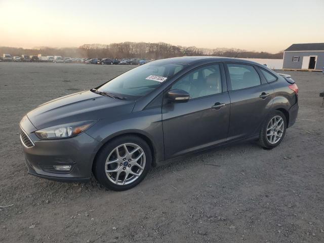 FORD FOCUS SE 2015 with VIN 1FADP3F21FL310730 - Photo from auction