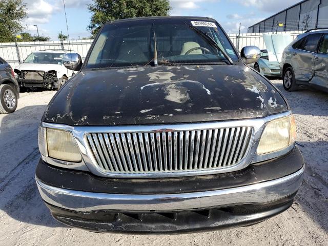 Photo 5 from auction – 1999 FORD F-150 with VIN 1FTRX17W5XNC03174
