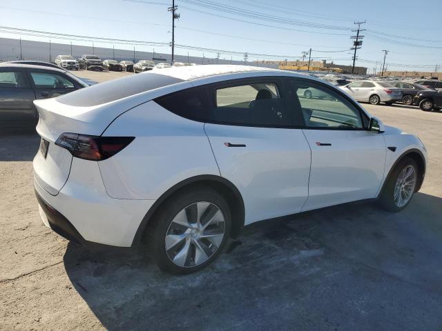 Photo 3 from auction – 2023 TESLA MODEL Y with VIN 7SAYGDED6PF970077