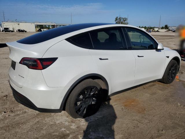 Photo 3 from auction – 2021 TESLA MODEL Y with VIN 5YJYGDEE0MF173776