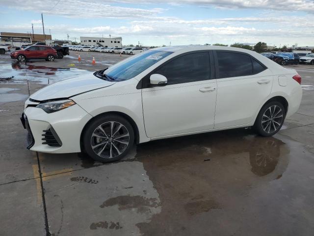 TOYOTA COROLLA L 2019 with VIN 5YFBURHE1KP897873 - Photo from auction