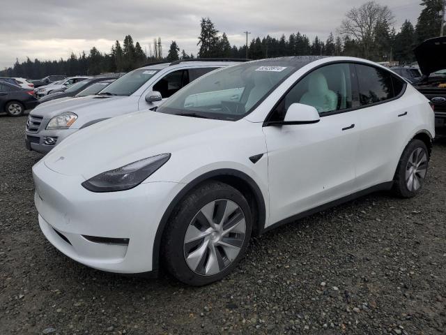 TESLA MODEL Y 2023 with VIN 7SAYGAEE3PF811654 - Photo from auction