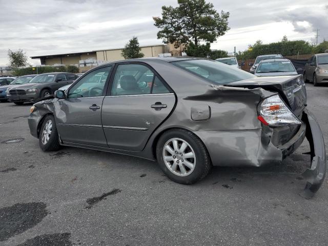 Photo 2 from auction – 2002 TOYOTA CAMRY LE with VIN JTDBE30K720134407