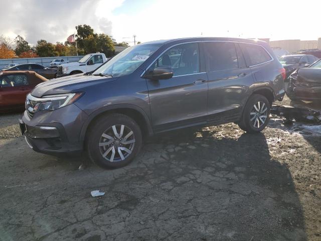 HONDA PILOT EXL 2021 with VIN 5FNYF6H5XMB049394 - Photo from auction