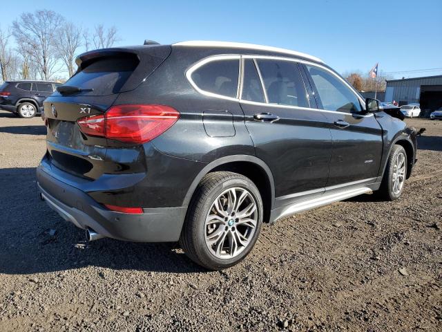 Photo 3 from auction – 2017 BMW X1 XDRIVE2 with VIN WBXHT3Z36H4A55975