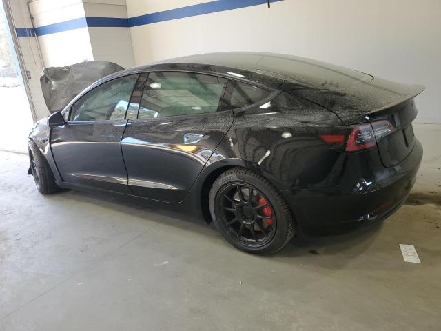 Photo 2 from auction – 2021 TESLA MODEL 3 with VIN 5YJ3E1EC4MF990908