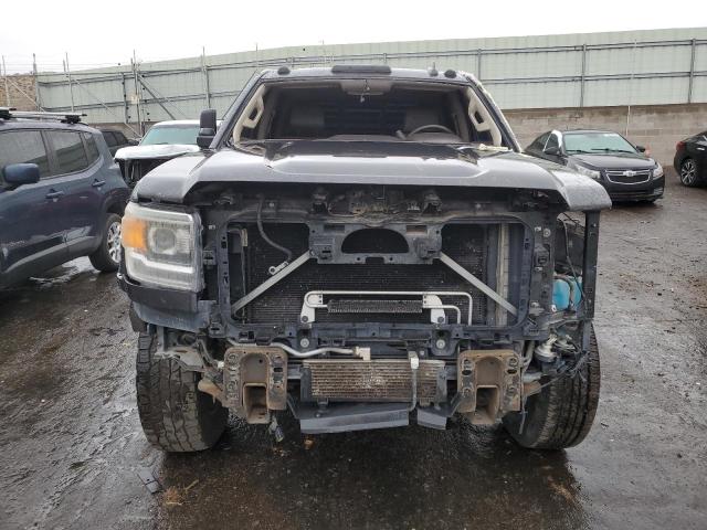 Photo 5 from auction – 2015 GMC SIERRA K25 with VIN 1GT120E8XFF529507