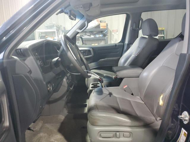 Photo 7 from auction – 2010 HONDA RIDGELINE with VIN 5FPYK1F54AB005105