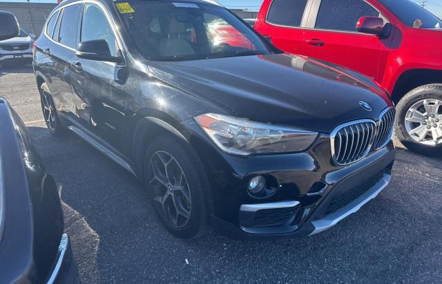 BMW X1 XDRIVE2 2016 with VIN WBXHT3C31GP886366 - Photo from auction