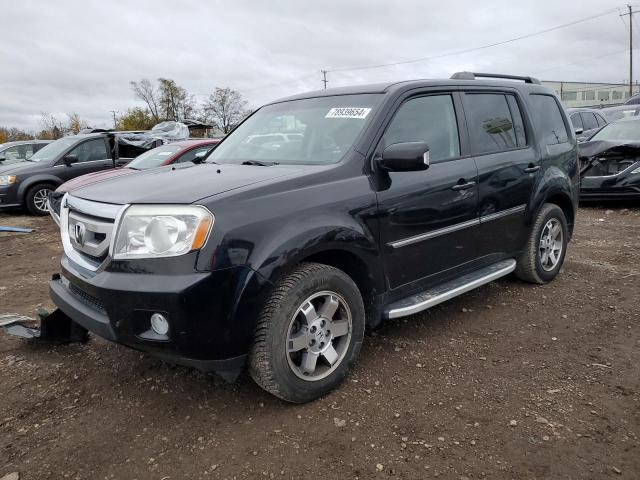 HONDA PILOT TOUR 2010 with VIN 5FNYF4H8XAB036025 - Photo from auction