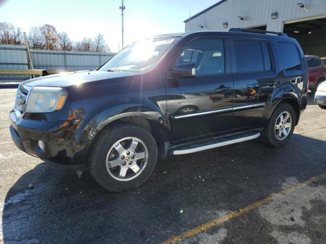 HONDA PILOT TOUR 2011 with VIN 5FNYF3H99BB051152 - Photo from auction