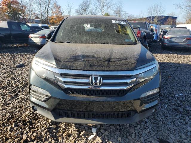 Photo 5 from auction – 2016 HONDA PILOT EXL with VIN 5FNYF6H5XGB095652