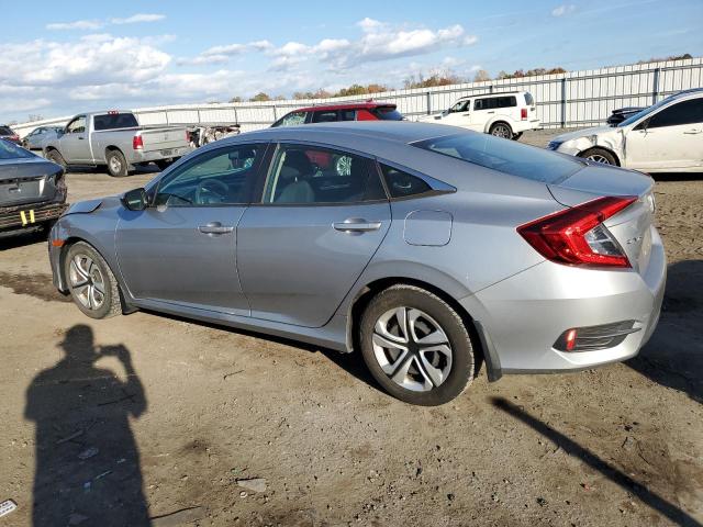 Photo 2 from auction – 2018 HONDA CIVIC LX with VIN 2HGFC2F59JH552238