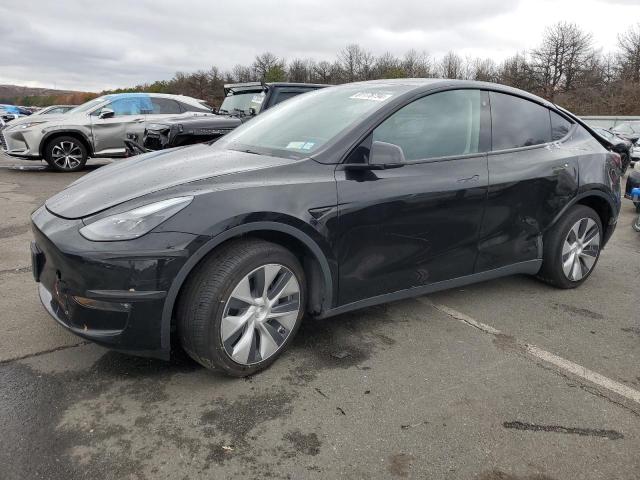TESLA MODEL Y 2022 with VIN 7SAYGAEE2NF524559 - Photo from auction