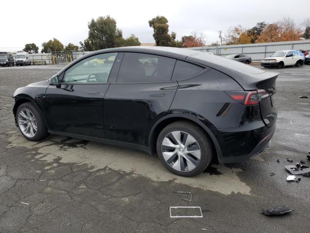 Photo 2 from auction – 2024 TESLA MODEL Y with VIN 7SAYGDEE0RF069797
